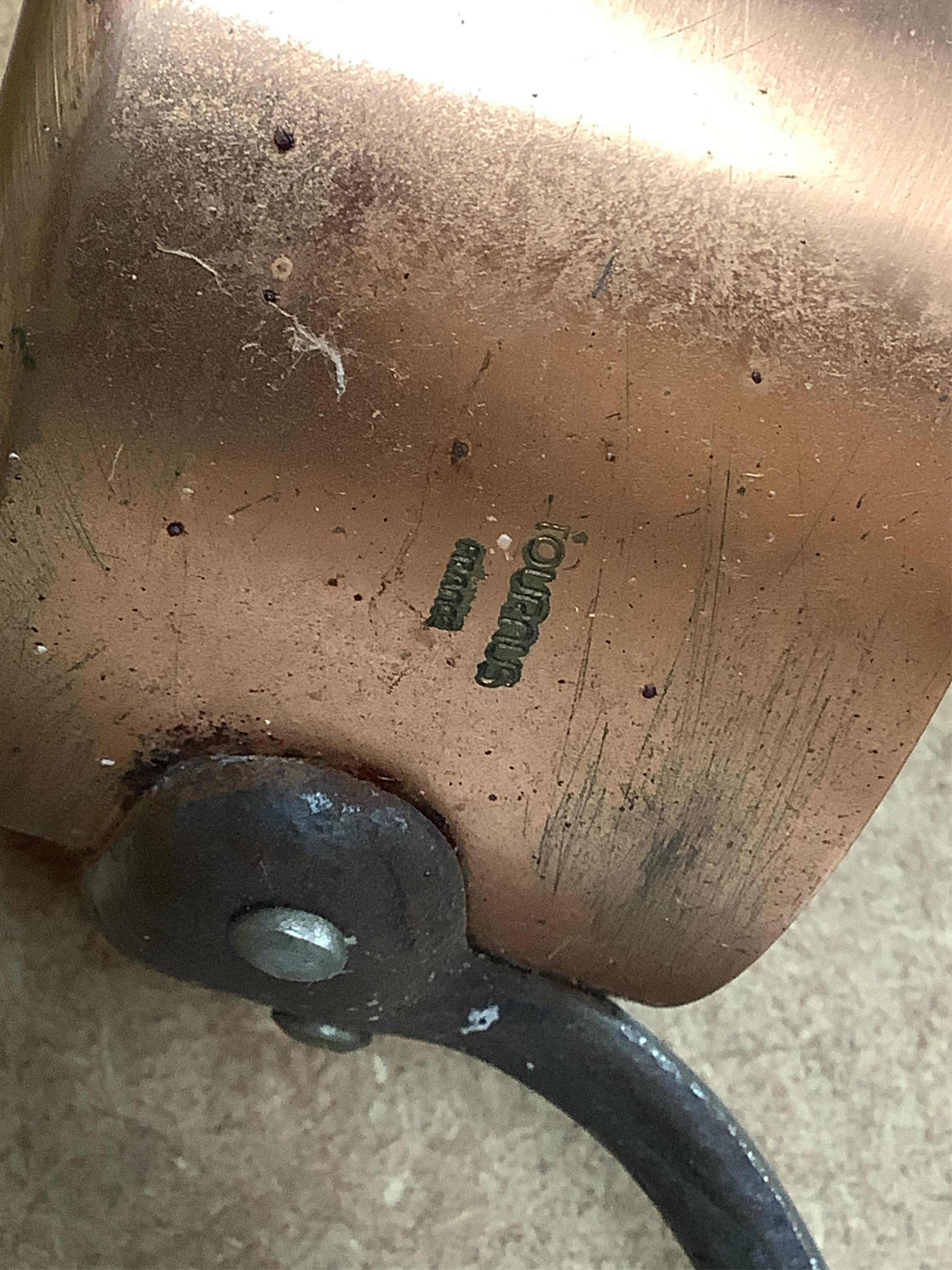 A graduated set of six French Tournus copper cooking pans, largest 44cm wide